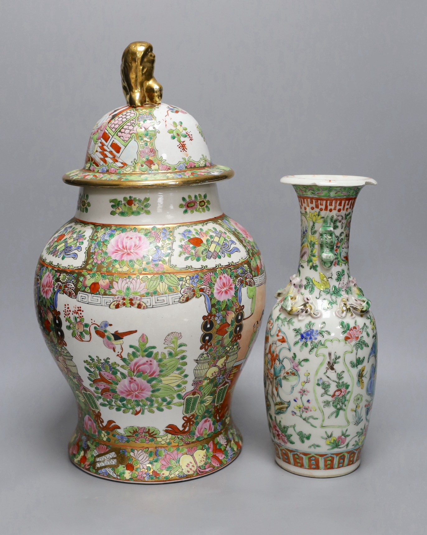 A 19th century Chinese famille rose vase and a later jar and cover, 19th century vase 30 cms high
